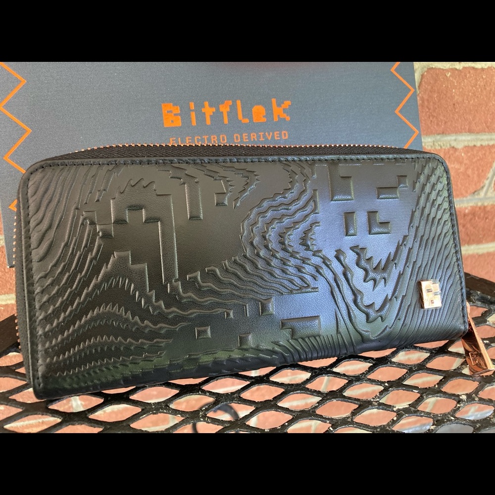 Bitflek black leather embossed wallet. New in box.